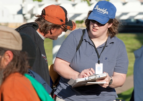 U.S. Census workers count the transient population gathered at Wooldridge Park in downtown Austin Tuesday night during a regularly scheduled dinner delivery to the homeless by the group Mobile Loaves and Fishes. Some participated in the questioning but others declined to be interviewed.