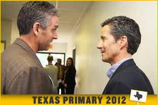 Texas State Reps Todd Smith - on left - and Kelly Hancock speak in the hallway outside a candidates forum they took part in that was held in Grand Prairie TX.