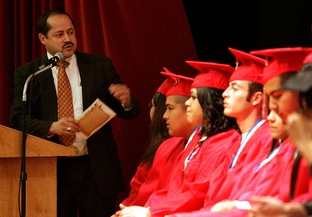 Pharr-San Juan-Alamo Independent School District superintendent Daniel King speaks to graduates from Options High School, College Career & Technology Academy and Teen-Age Parenting Program High School during their graduation ceremony December 16, 2010 at the San Juan Middle School Auditorium in San Juan, Texas.