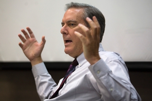 Texas Forensic Science Commission Chairman John Bradley listens to other board members during a scheduled meeting on September 17, 2010 in Dallas, Texas.