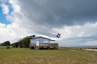 Bill and Gail Mullinax's 720-square-foot Laguna Madre cabin is accessible only by boat. It is about a 10-minute ride from the nearest marina in Corpus Christi, where the couple lives.