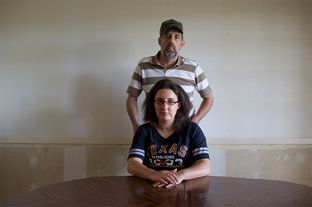 Michelle Gaines, 26, and her father Michael Gaines in their home in Palestine, TX, on Sunday, July 22, 2012.