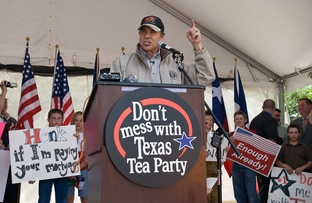 Texas Gov. Rick Perry addresses a crowd estimated at 1,000 at a tax day "tea party" April 15 at City Hall to protest federal government stimulus programs