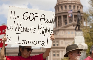 Protesters on March 6, 2012, rallying at the Capitol against the likely demise of the state's Women's Health Program.