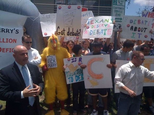Austin, TX. June 15, 2010. Perry spokesman Mark Miner flanked by Bill White supporters.