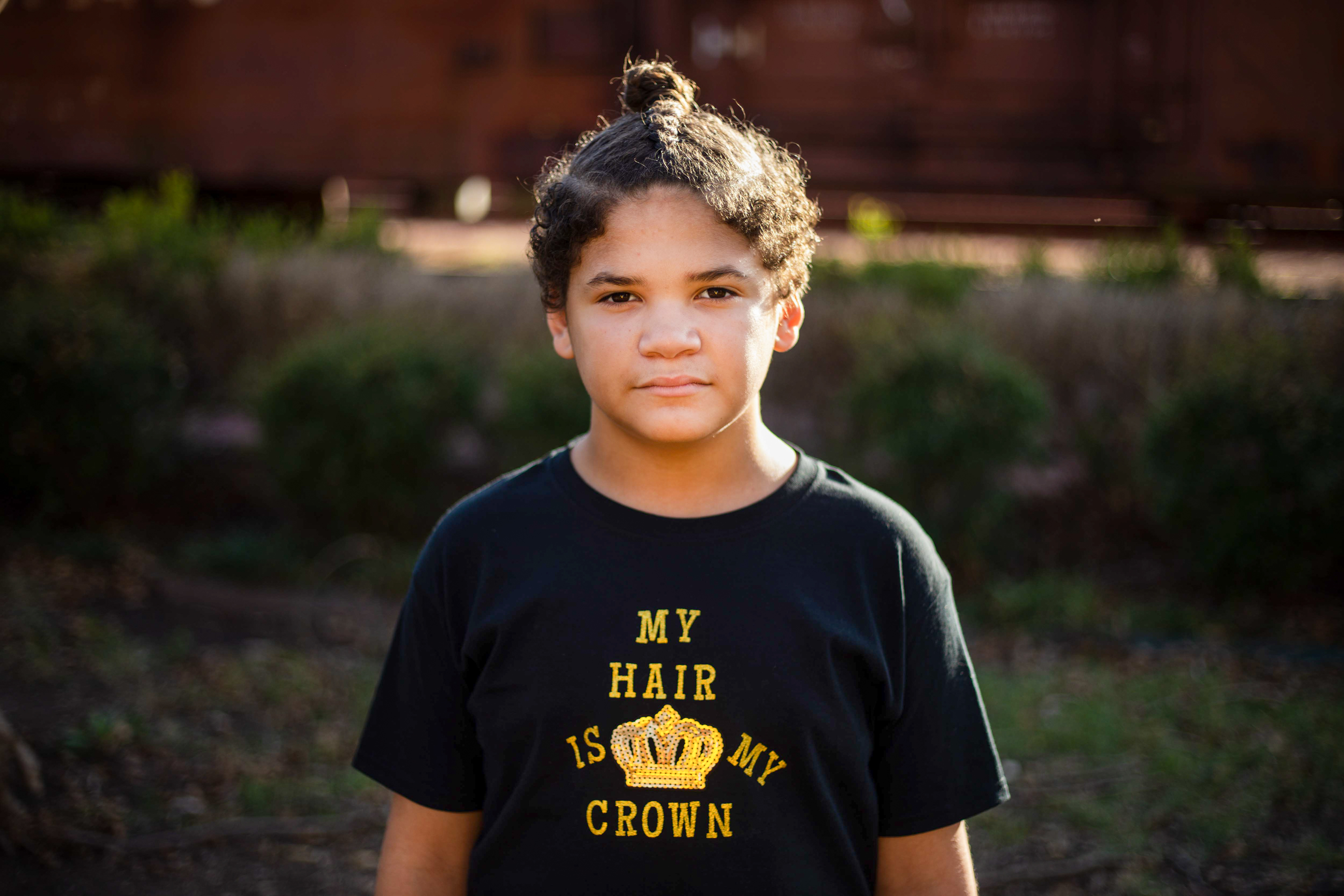 Maddox Cozart, 12, poses for a portrait in Temple on Dec. 8, 2021. Maddox was placed in in-school suspension over his hairstyle earlier this year.