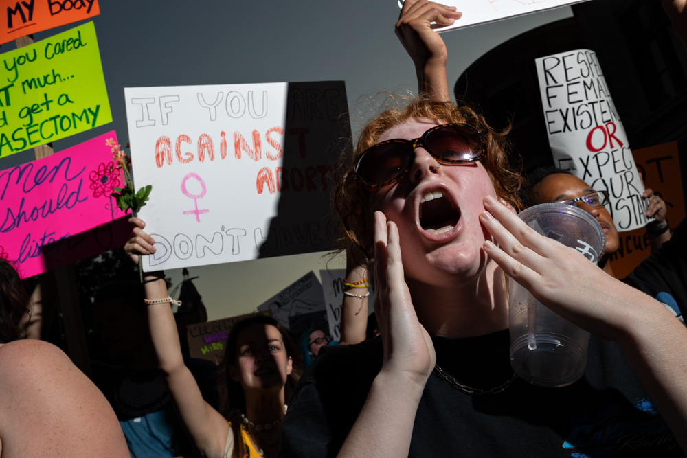 Kathryn Chavez chants during a march in Dallas against the U.S. Supreme Court’s reversal of Roe v. Wade. The decision has effectively ended abortion access for women in Texas. (Shelby Tauber for The Texas Tribune)