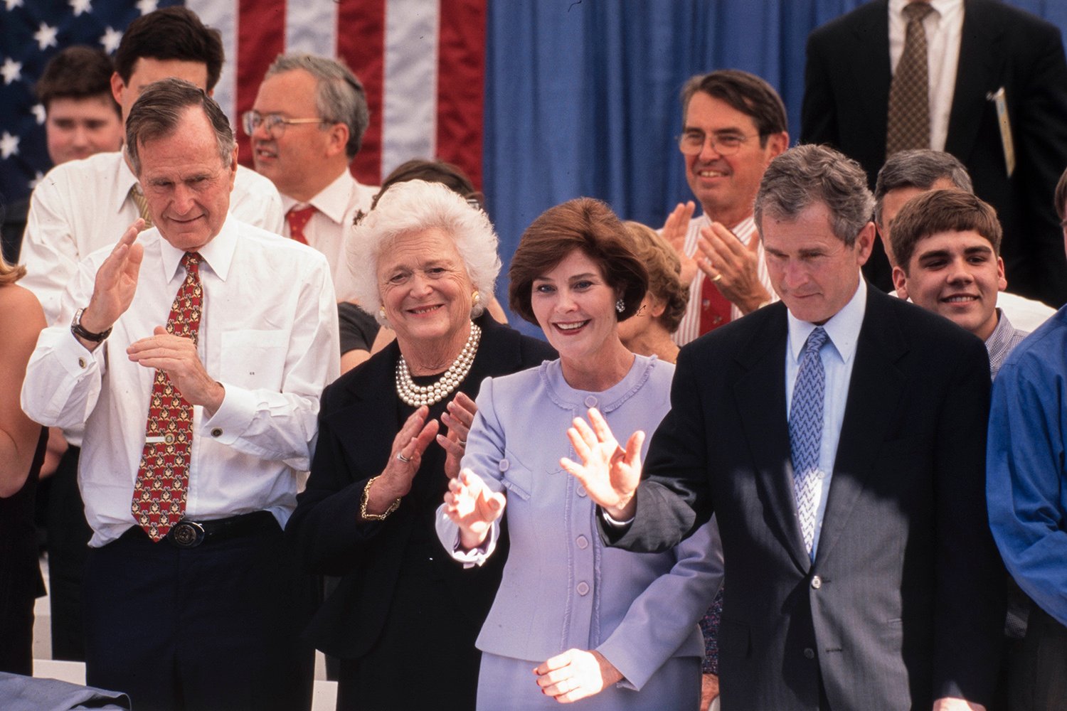 Left to right: Former President George H.W. Bush, his wife, former First Lady Barbara Bush, Laura Bush and her husband George W. Bush, who was being inaugurated for his second term as governor, in Austin on Jan. 19, 1999. 