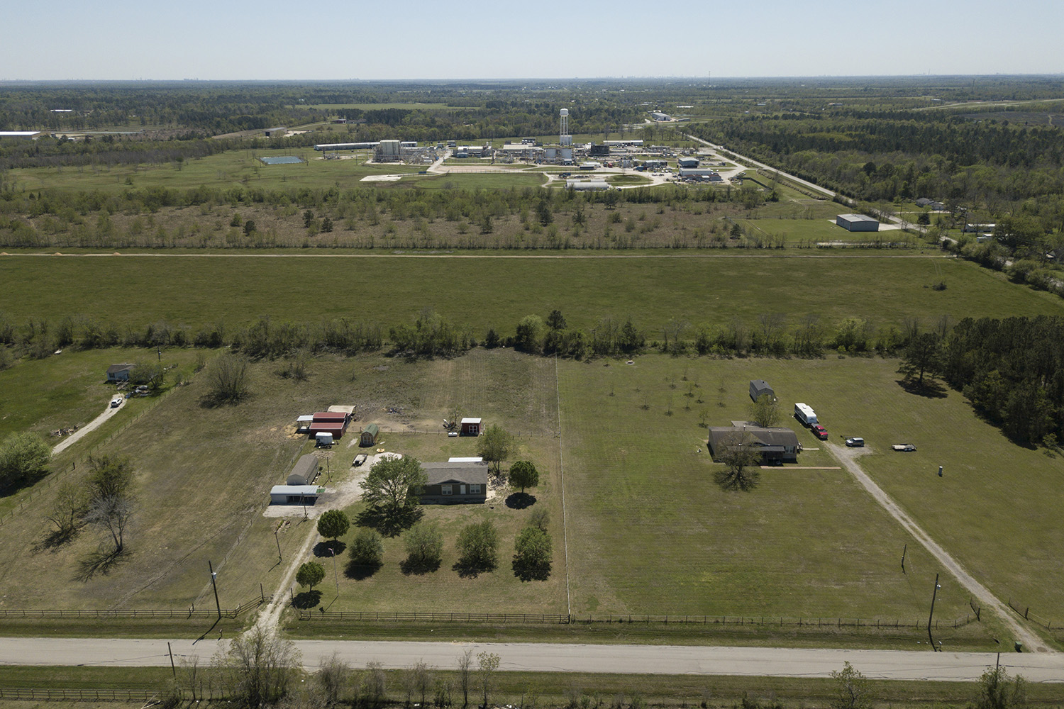 Homes in view of the Arkema chemical plant in Crosby, Texas.