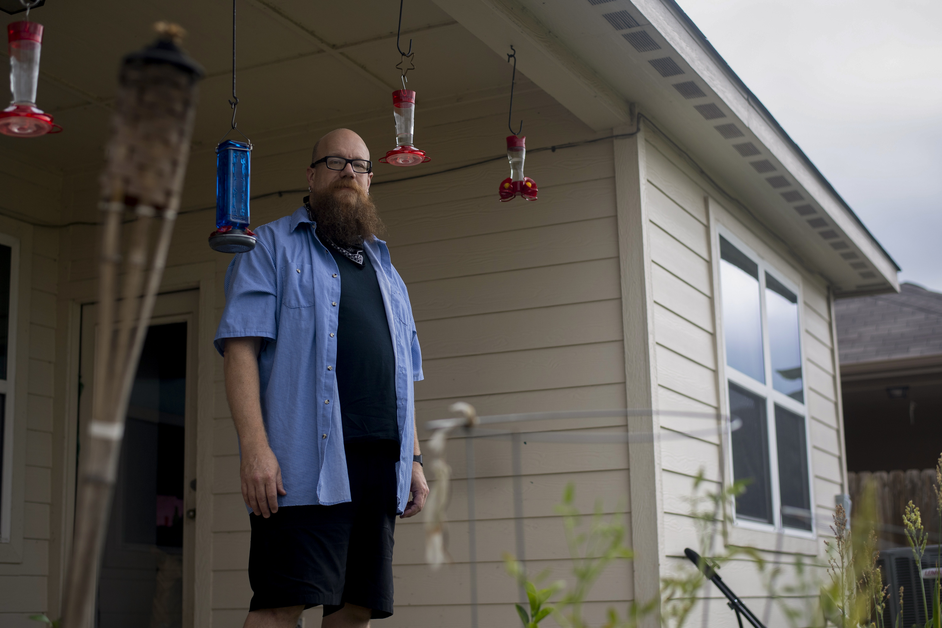 Marney Mason outside his home on July 21, 2020 in Manor. Mason, a dishwasher at a restaurant, was out of work due to the pandemic.