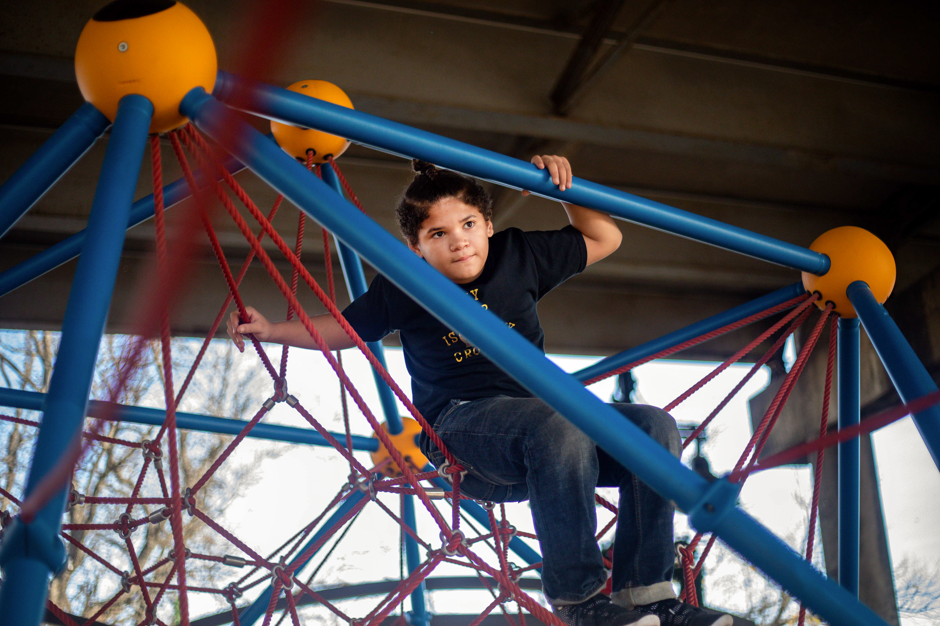 Maddox Cozart, 12, plays at a park in Temple on Dec. 8, 2021. Maddox was placed in in-school suspension over his hairstyle earlier this year.