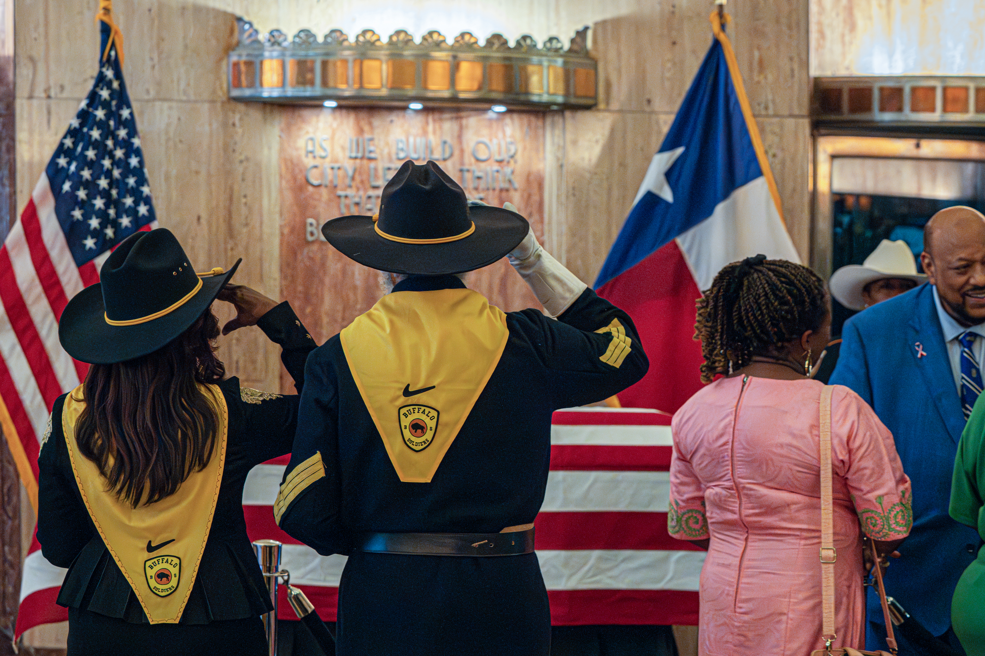 Buffalo Soldiers Lauren Nelson, left, and Billy Smith, right, salute late congresswoman Sheila Jackson Lee who is laid in state in Houston’s City Hall, Monday, July 29, 2024, in Houston.