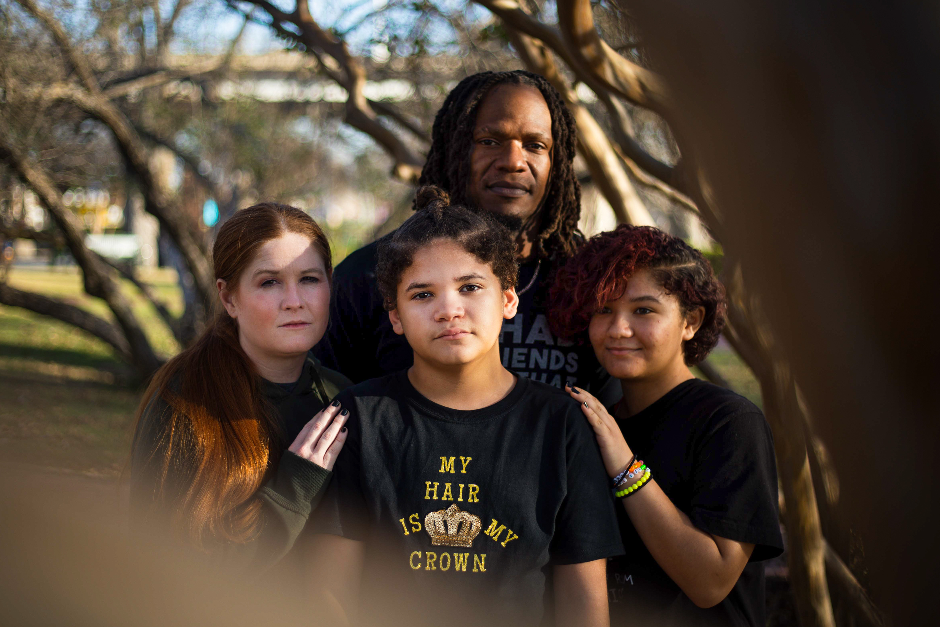 From left: Hope Cozart, Maddox Cozart, Dante Cozart and Mia Cozart pose for a portrait in Temple on Dec. 8, 2021. Maddox's school in the Troy Independent School District placed him in in-school suspension over his hairstyle earlier this year.