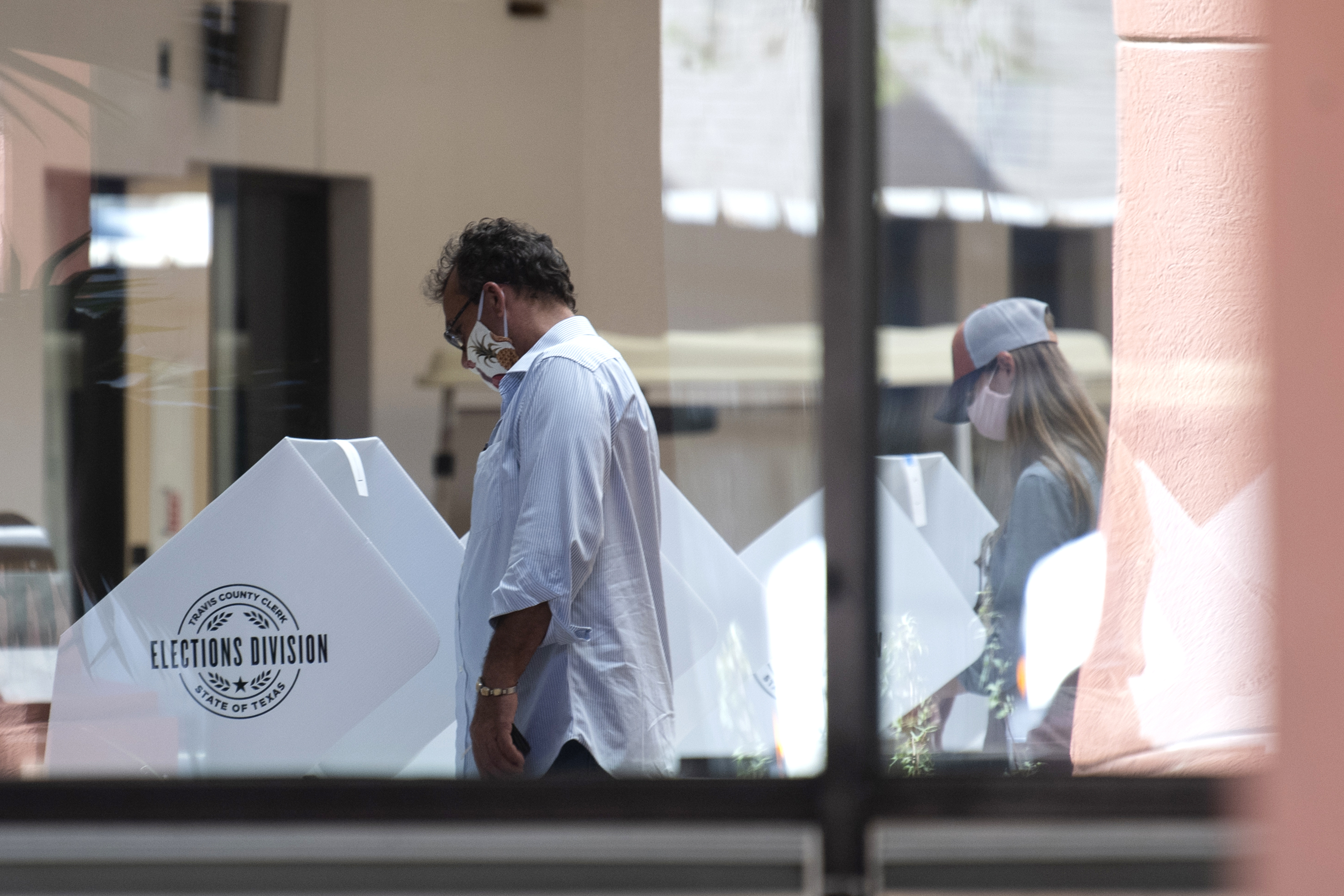 Voters cast their ballots at the Great Baptist Hills Church in Austin in July.