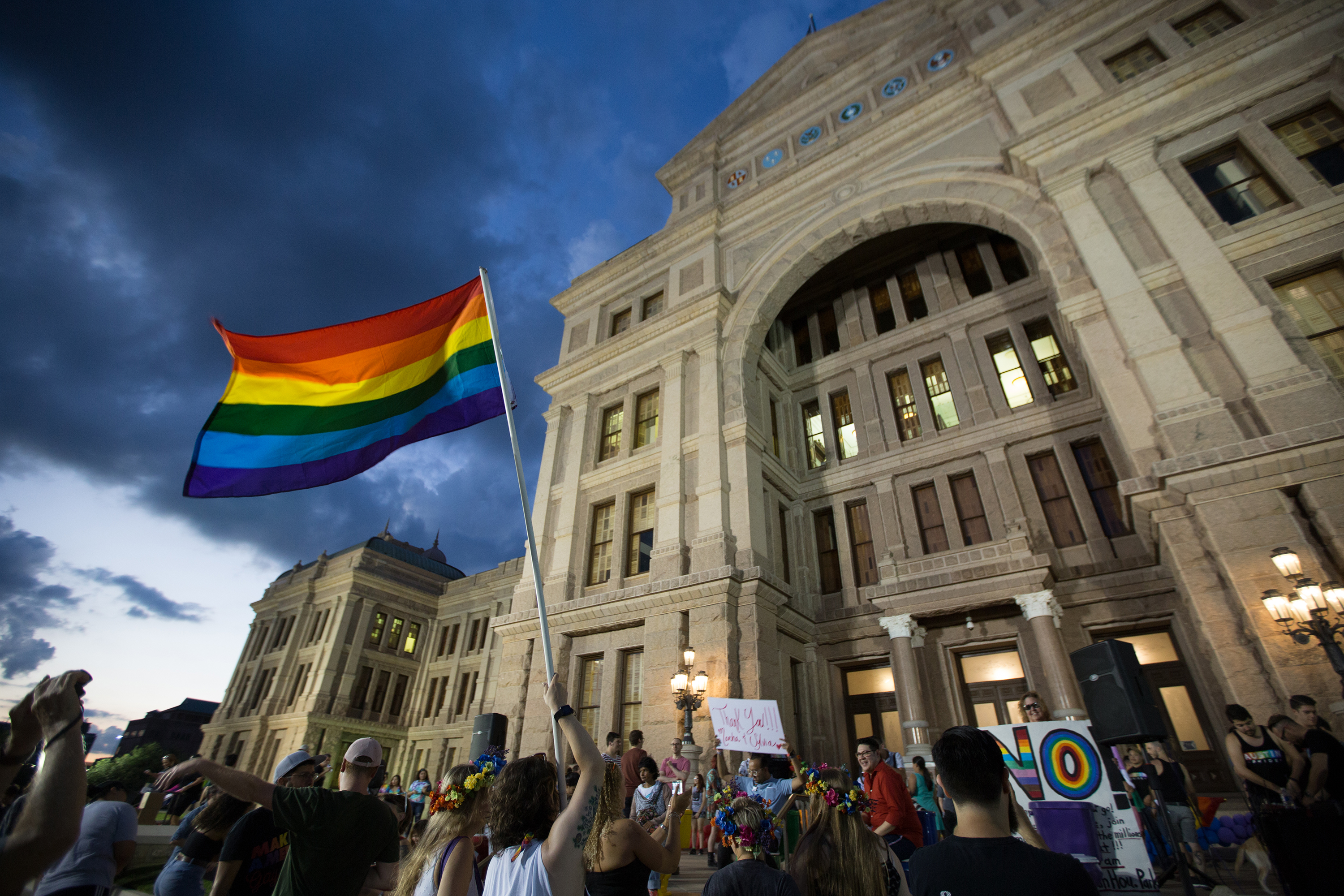 Members of Austin’s LGBTQ community gather on the steps of the Texas Capitol in 2017 to celebrate the anniversary of the 1969 Stonewall riots. 