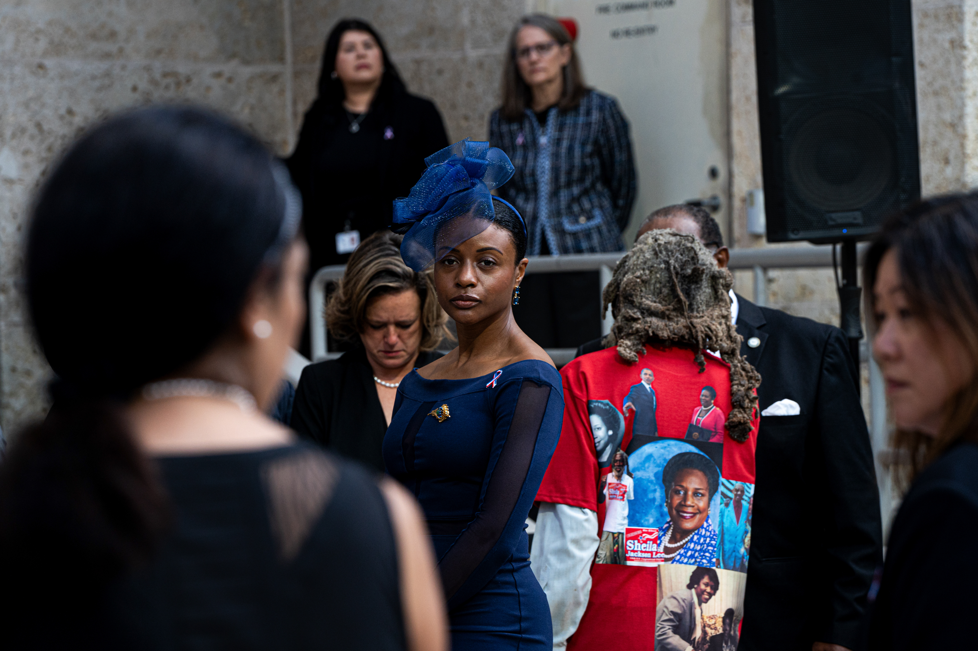 Tyesha Hill waits on the steps of Houston’s City Hall to pay her respects to the late congresswoman Sheila Jackson Lee as she lays in state, Monday, July 29, 2024, in Houston.