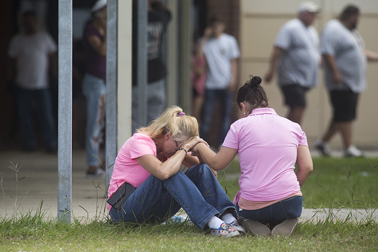 Photos: At playoff game, Houston rallies around Santa Fe High School  survivors