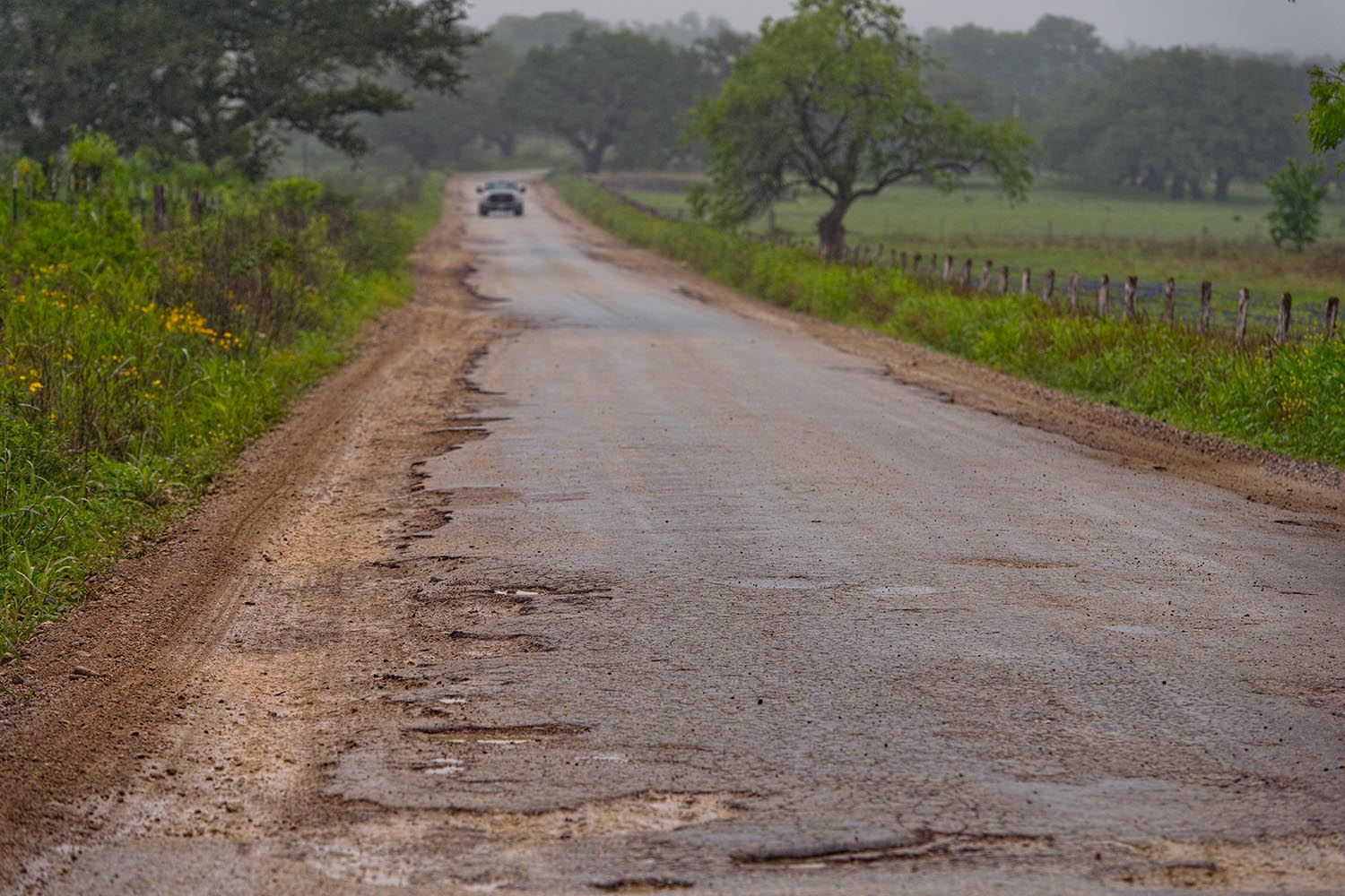 Badly damaged road on FM 2067/ Cheapside Rd. near Cheapside on April 10, 2018.