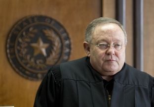 District Court Judge John Dietz of Austin is shown in his courtroom on Feb. 4, 2013, before he ruled that the state's school finance system was unconstitutional.