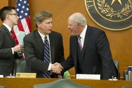 State Rep. Dan Branch, R-Dallas,l, and State Sen. Kel Seliger, R-Amarillo, shake hands upon convening the Joint Committee on Higher Education Oversight on March 19, 2013.