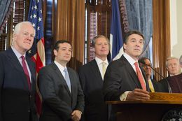 U.S. Sen. John Cornyn, l, U.S. Sen. Ted Cruz, Lt. Gov. David Dewhurst and Gov. Rick Perry at a Capitol press conference on Medicaid on April 1, 2013.