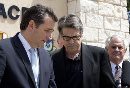 U.S. Sen. Ted Cruz, Gov. Rick Perry and state Rep. Jimmie Don Aycock, R-Killeen, are shown at a press conference at Fort Hood, Texas, on April 4, 2014.