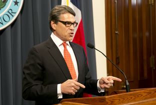 Gov. Rick Perry speaks at an Aug. 16, 2014, news conference, the day after a grand jury indicted him on charges related to his veto of public integrity unit funding. "This indictment amounts to nothing more than abuse of power," Perry said.