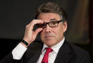 Gov. Rick Perry adjusts his glasses during his appearance at the Texas Tribune Festival on Sept. 21.
