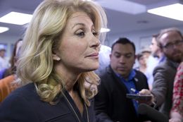 State Sen. Wendy Davis speaking to the press after a Travis County Democratic campaign rally on Oct. 22, 2014.