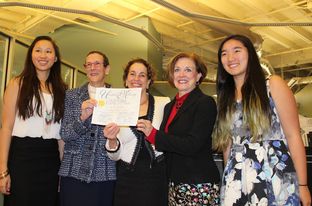 Sarah Goodfriend, second from left, and Suzanne Bryant, center, with their daughters (far left and far right) and Travis County Clerk Dana DeBeauvoir, second from right. DeBeauvoir issued Goodfriend and Bryant a marriage license on Feb. 19, 2015.