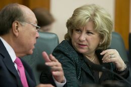 Senate Finance Committee Chairwoman Jane Nelson, R-Flower Mound, confers with Sen. Juan "Chuy" Hinojosa, D-McAllen, during a March 11, 2015, committee hearing on state contracting issues.