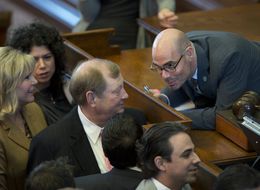 State Rep. Dennis Bonnen, R-Angleton, confers with State Rep. John Otto, R-Dayton, during a point of order called on House Bill 11 on March 18, 2015.