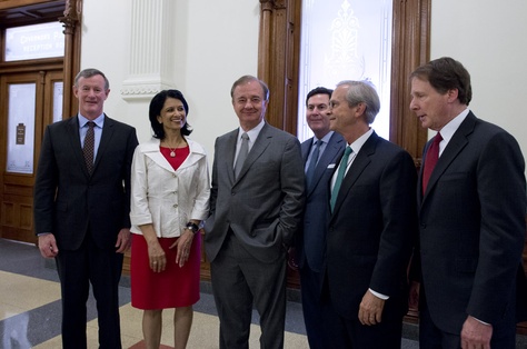 Texas' seven university system chancellors gathered outside Gov. Greg Abbott's office in 2015. From left to right, Bill McRaven of the University of Texas System, Renu Khator of the University of Houston System, John Sharp of the Texas A&M University System, Brian McCall of the Texas State University System, Lee Jackson of the University of North Texas System and Robert Duncan from the Texas Tech University System. 