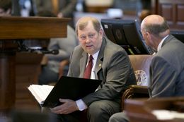 Rep. John Otto R-Dayton on May 29, 2015 holds budget binder on his lap