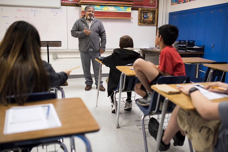 Ramon Cavazos teaches a middle school business class in the Olfen Independent School District in Rowena, Texas, on Jan. 20, 2016.