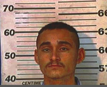 Victor Reyes, shown in 2001 jail mug shot from Hidalgo County. Authorities say Reyes, an undocumented immigrant, went on a January 2015 shooting spree in Harris County that killed two and wounded three.