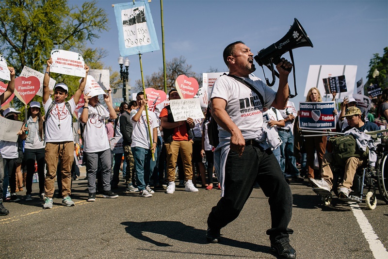 Tomas Martinez, with GLAHR, a grass roots organization from Atlanta, chants to excite the crowd in front of the U.S. Supreme Court in Washington, D.C., on Monday, April 18, 2016. Hundreds gathered in front of the U.S. Supreme Court to show their support for President Obama’s immigration executive action as the Court hears oral arguments on the deferred action initiatives, DAPA and expanded DACA.