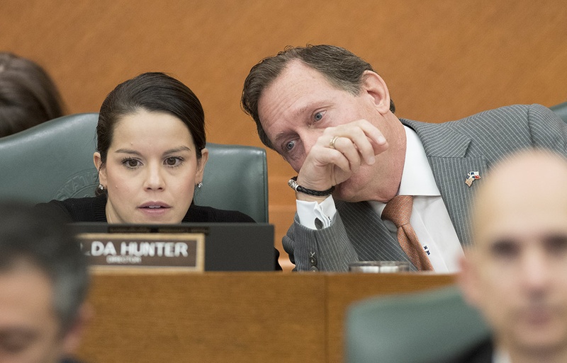 Nelda Hunter, House Appropriations Committee clerk, confers with chair State Rep. John Zerwas, R-Richmond, during a public hearing Feb. 15, 2017 on health and human services funding and border security.