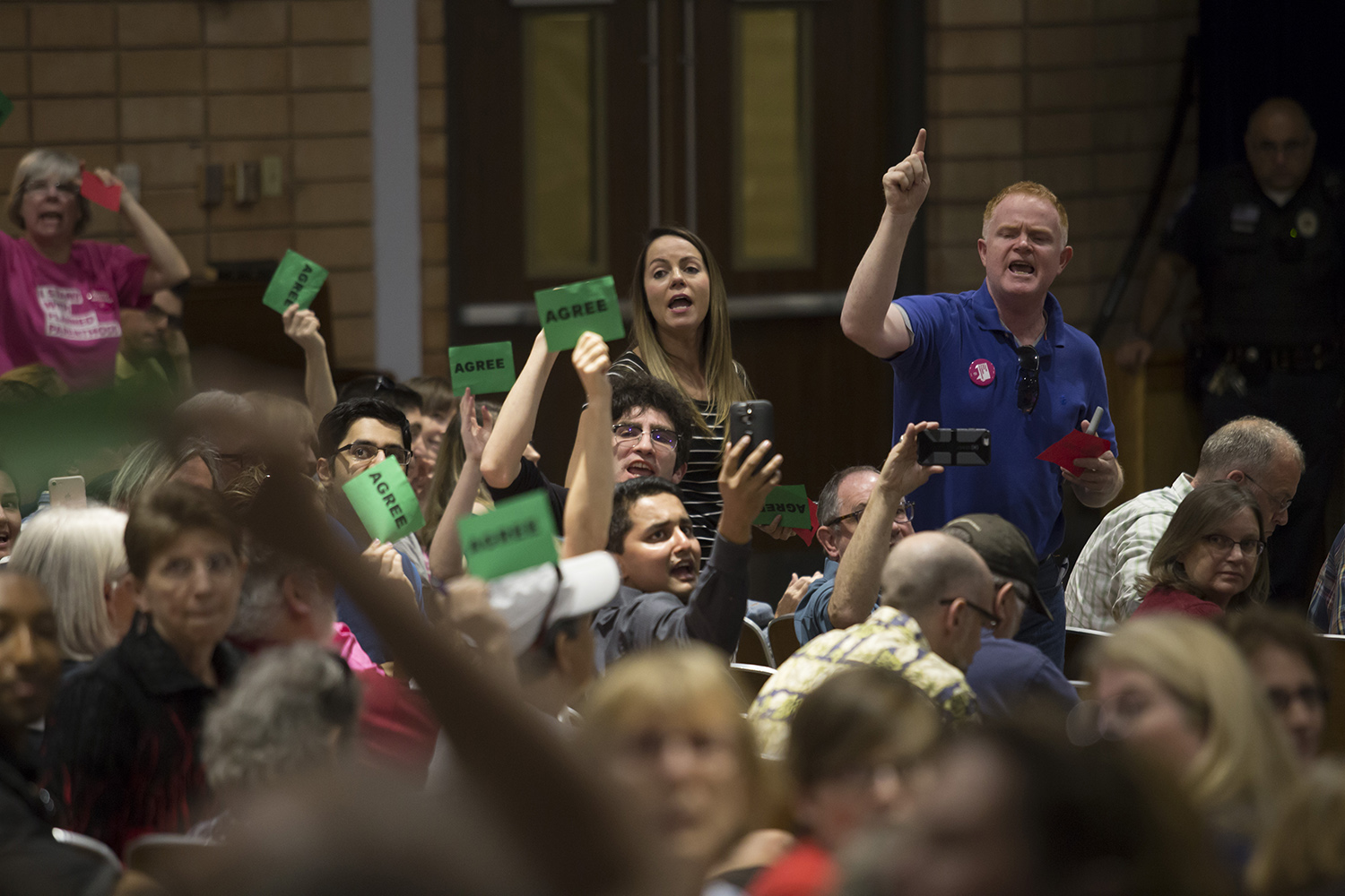 Constituents react at a town hall held by U.S. Rep. John Culberson, R-Houston, on March 25, 2017.