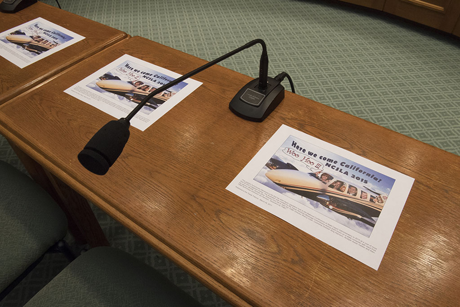 Copies of a flier created internally at the Texas Alcoholic Beverage Commission laid out at the witness table ahead of a hearing held by the House General Investigating & Ethics Committee on April 13, 2017.