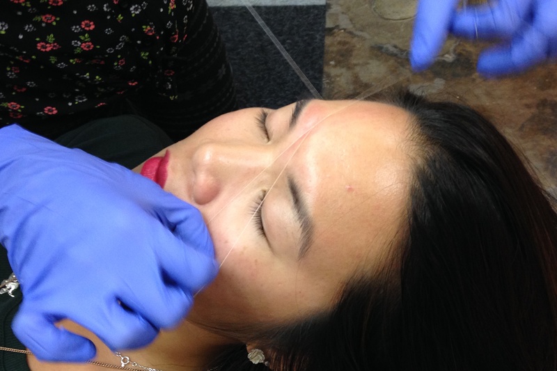 Bri Liu, a client at Wink Threading Salon in Austin.
