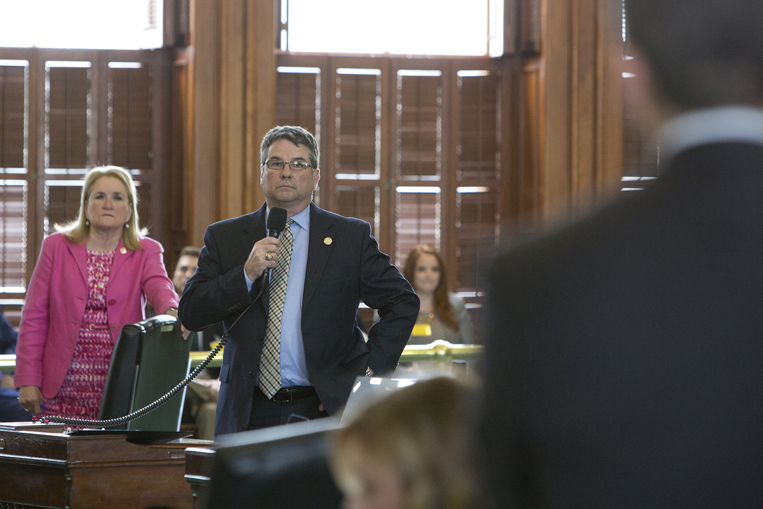 State Sen. Sylvia Garcia, D-Houston, looks on as Sen. Charles Perry, R-Lubbock answers questions about Senate Bill 4 on May 3, 2017.