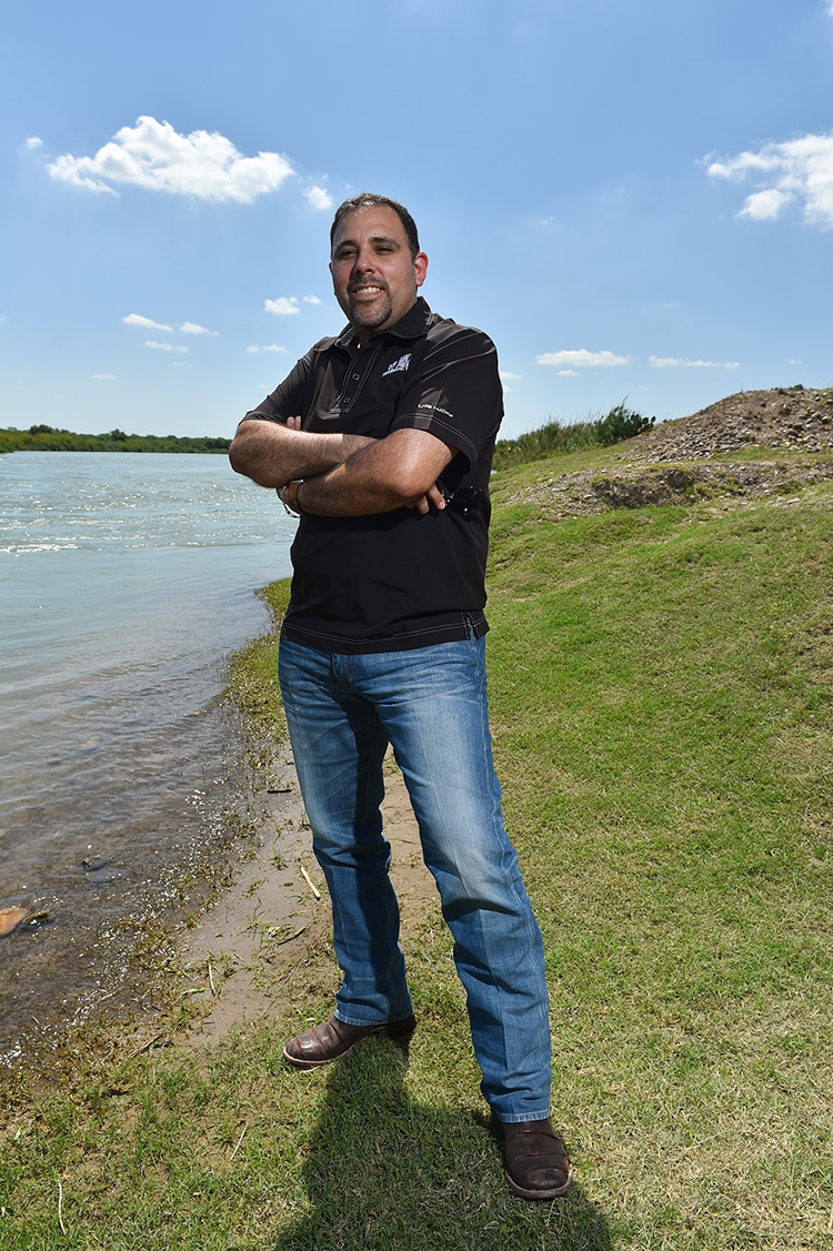 Salvador Salinas in his 500-acre property in Maverick County. The private property ends where the banks of the Rio Grande begin.