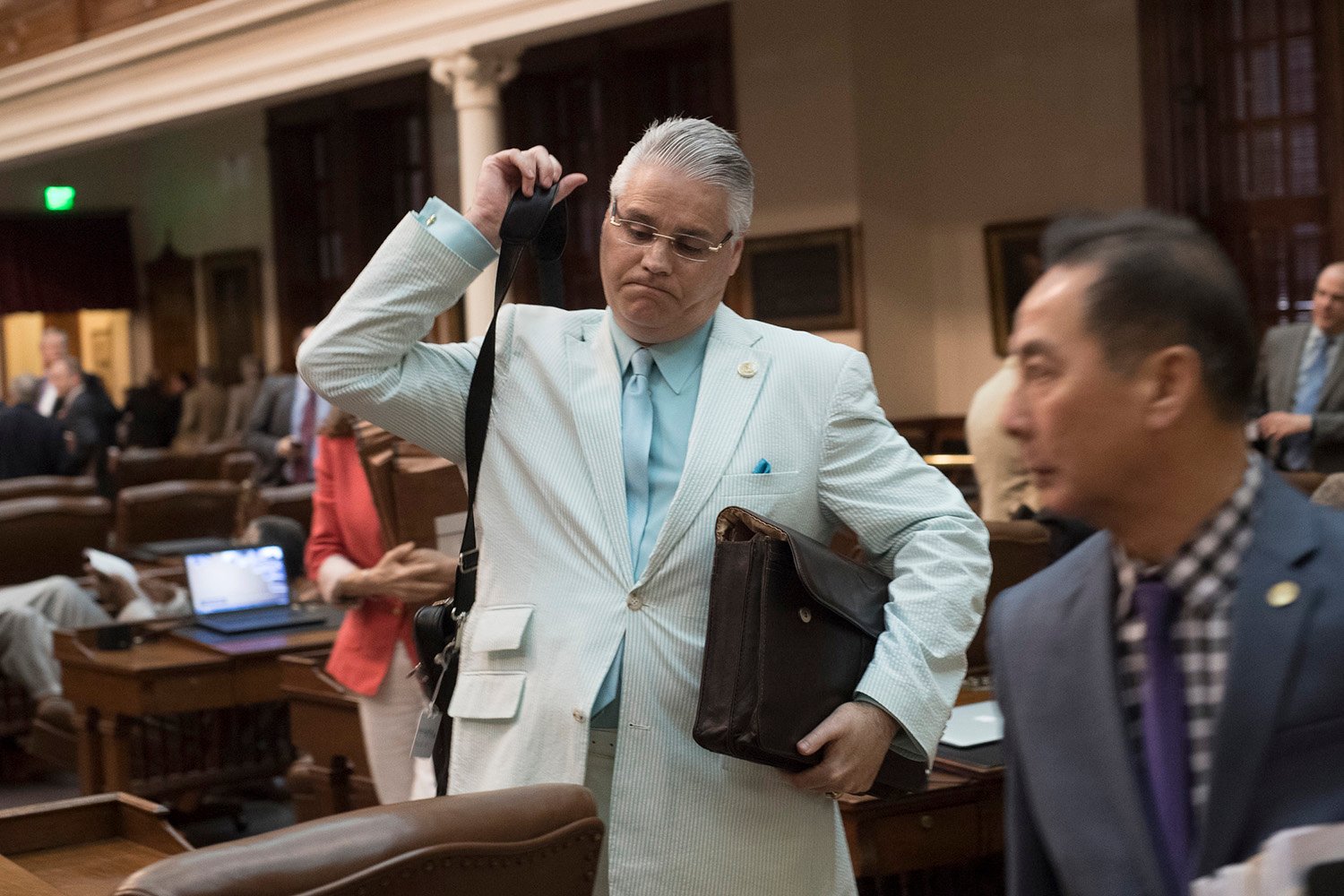 12:02 a.m. State Rep. Dan Huberty, R-Houston, prepares to leave the House after the midnight deadline passes. As promised, the Texas Freedom Caucus killed over 100 local and consent bills later that Friday.