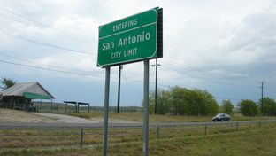San Antonio city limit sign on U.S. Highway 90 west of the city. 