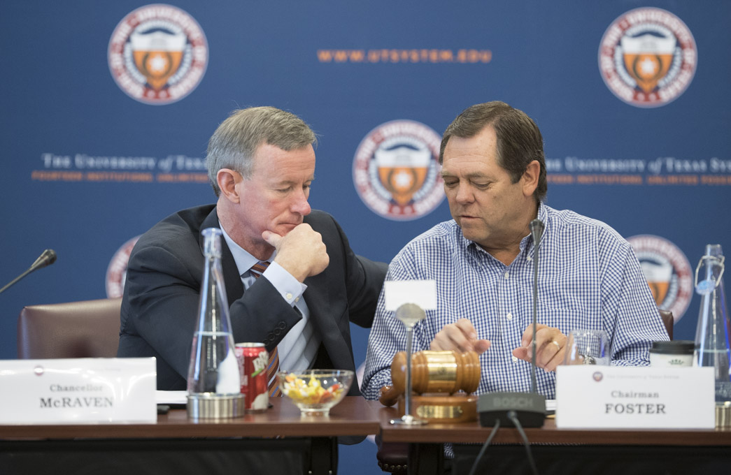 UT System Chancellor Bill McRaven chats with Board of Regents chairman Paul Foster during a July meeting.