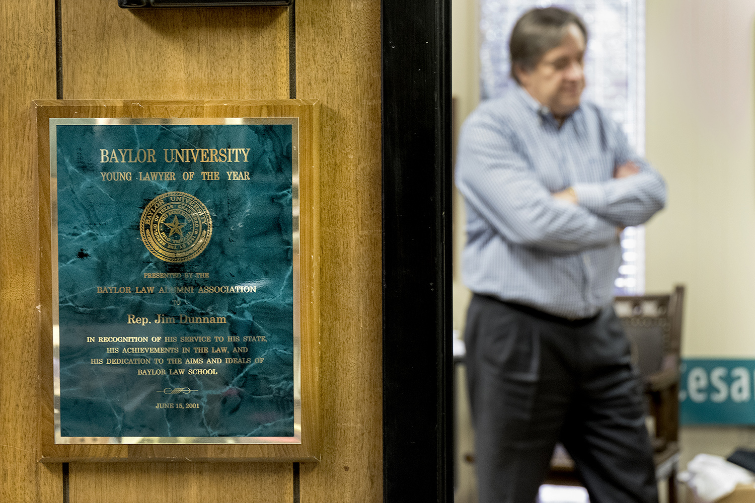 A plaque outside attorney Jim Dunnam's office in Waco commemorating his selection as Baylor University Young Lawyer of the Year in 2001. 