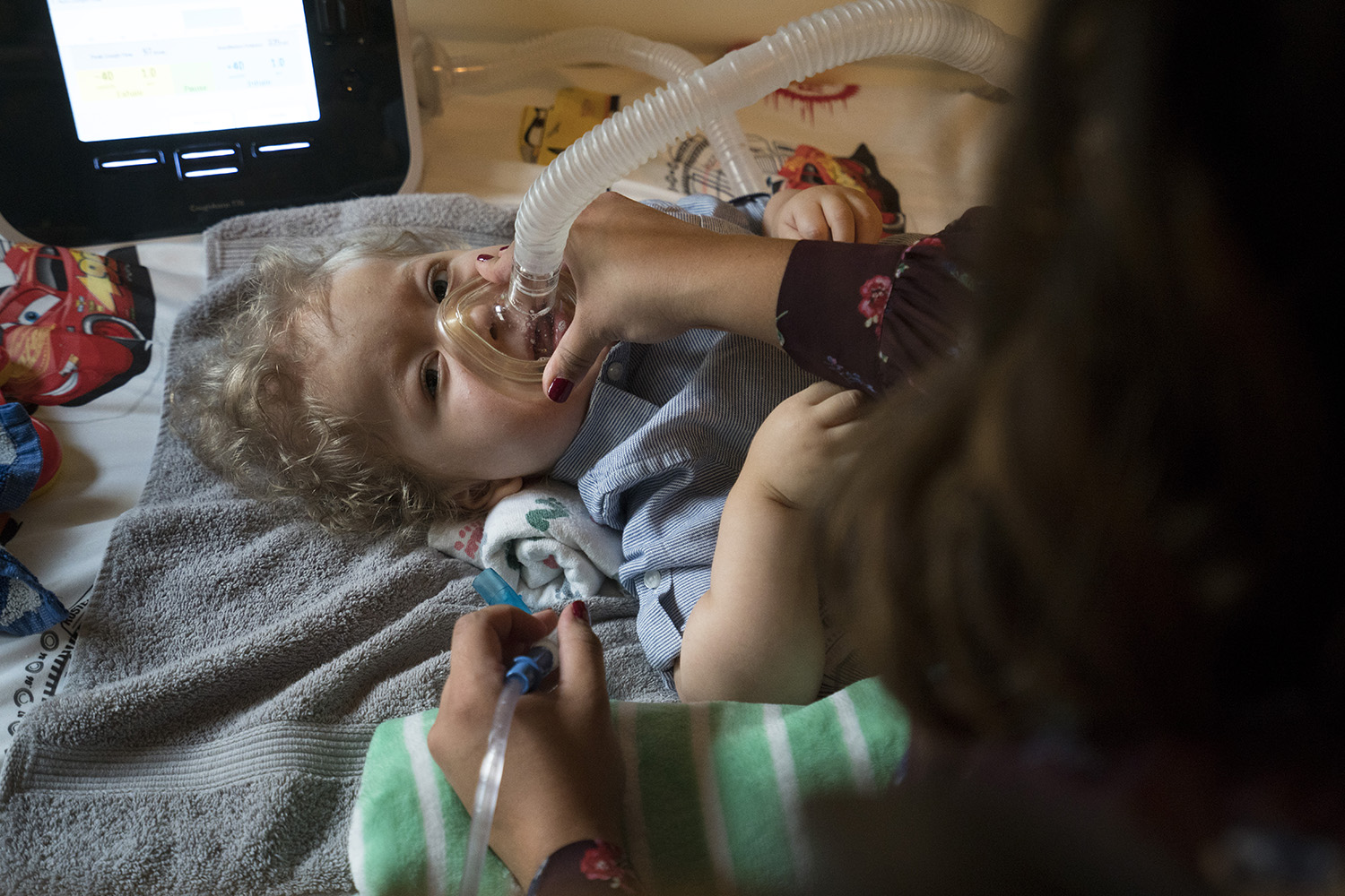 Kristen Resendez uses a suction and cough machine to help her son, Jack, breathe. Spinal muscular atrophy can weaken muscles, making simple tasks like breathing and chewing exhausting.