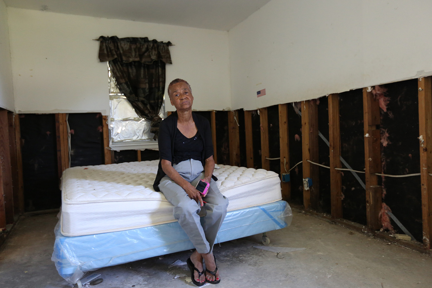 Janice Stubbs holds back tears speaking of the day her 13-year-old grandson was taken away in handcuffs from her house, the same house that flooded months later during Hurricane Harvey and displaced her family.