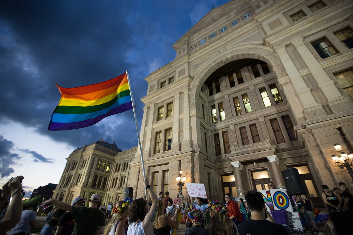 Demonstrators gather on the steps of the state Capitol on June 28, 2017 to celebrate the anniversary of the 1969 Stonewall riots.